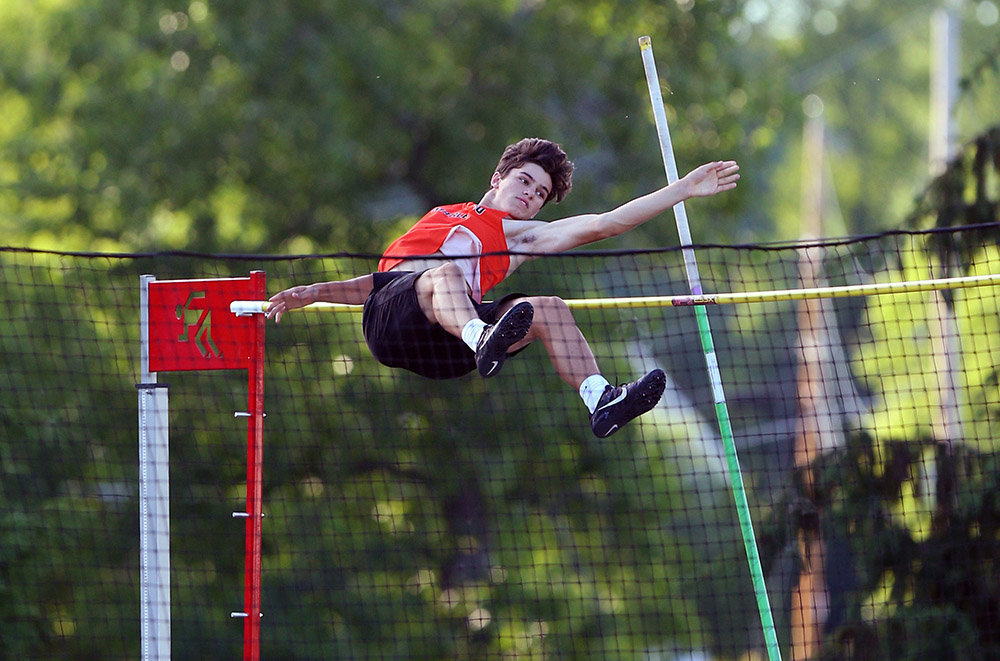 Pole vaulter Colin Robertson competes during the Section 9 Class C track finals at Marlboro High School.